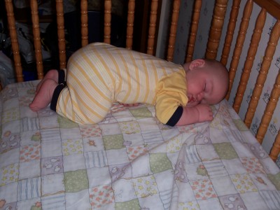 [Andrew sleeping in the crib]
