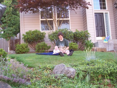 [Andrew sitting up on Jill's lawn]