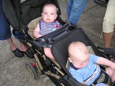 [Andrew and Owen in stroller, Andrew not so sure]