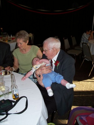 [Great-grandpa holding Andrew]