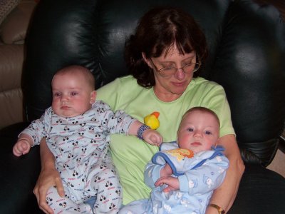 [Nancy holding both boys]