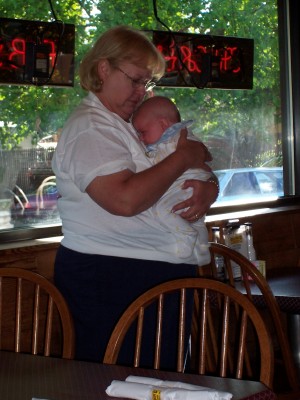 [Grandma Toni and Andrew by the window]